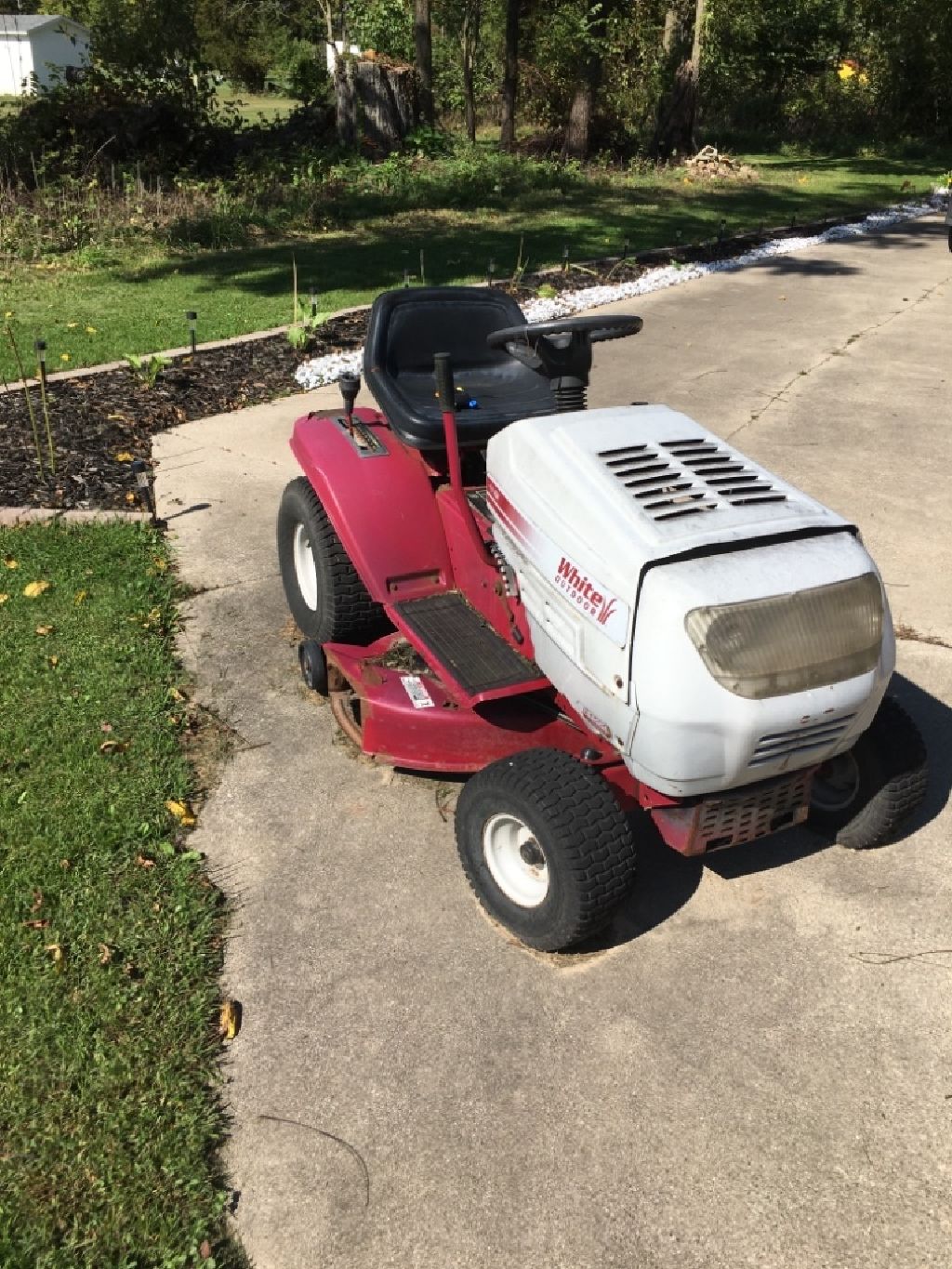 White outdoor riding mower