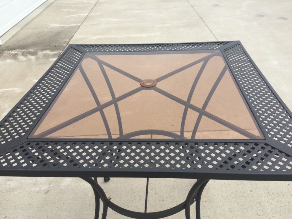 Wrought iron bar height patio tsble