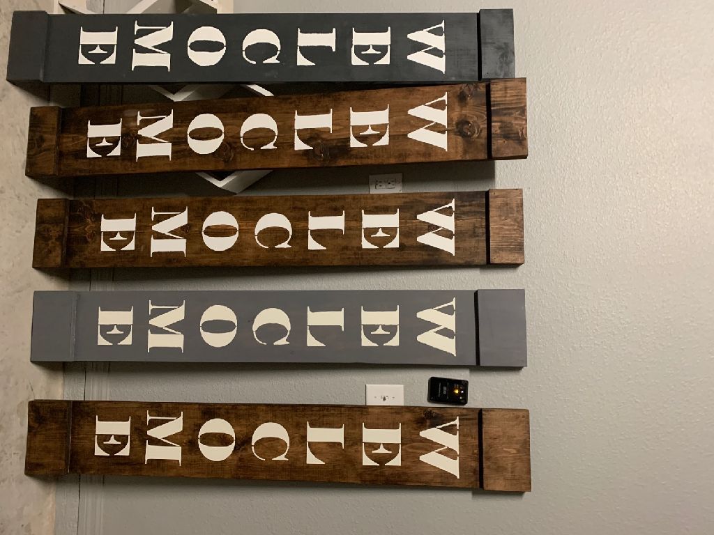 Wooden welcome entrance sign