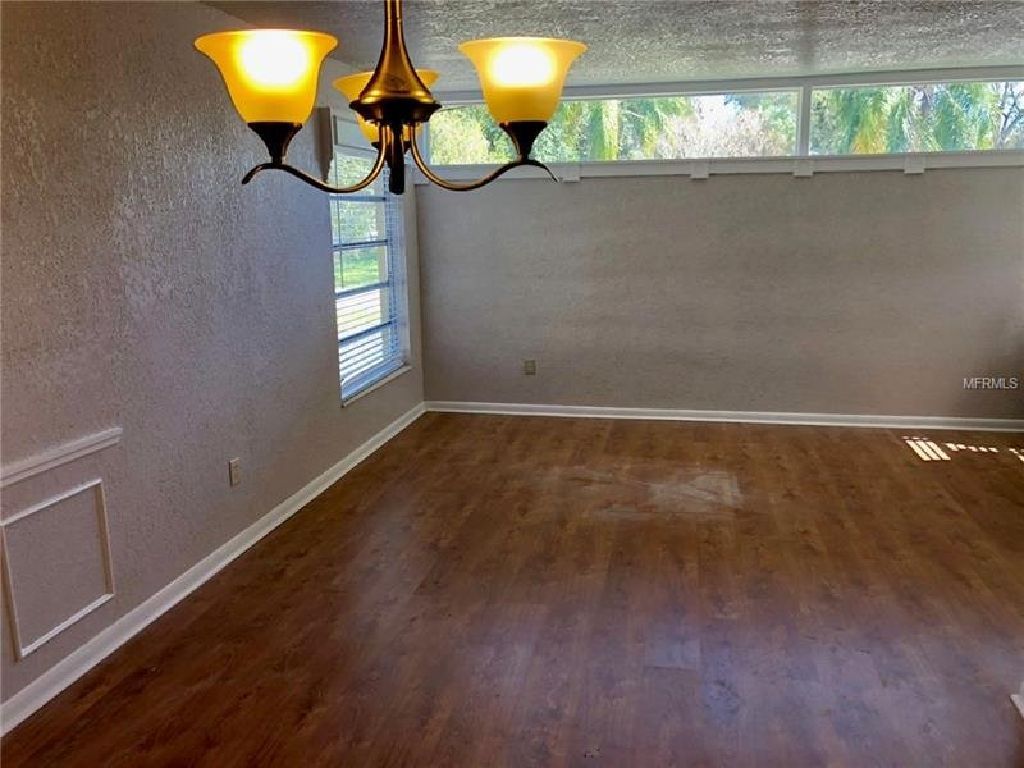 This home features newly painted exterior and interior, new kitchen with custom made wood cabinets.