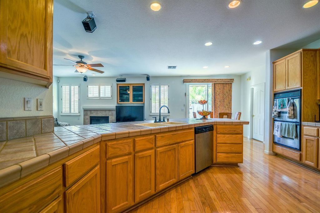 Huge Price Reduction. Spacious & Ideal home for Sale in Gated Community w/ swimming pool & solar!