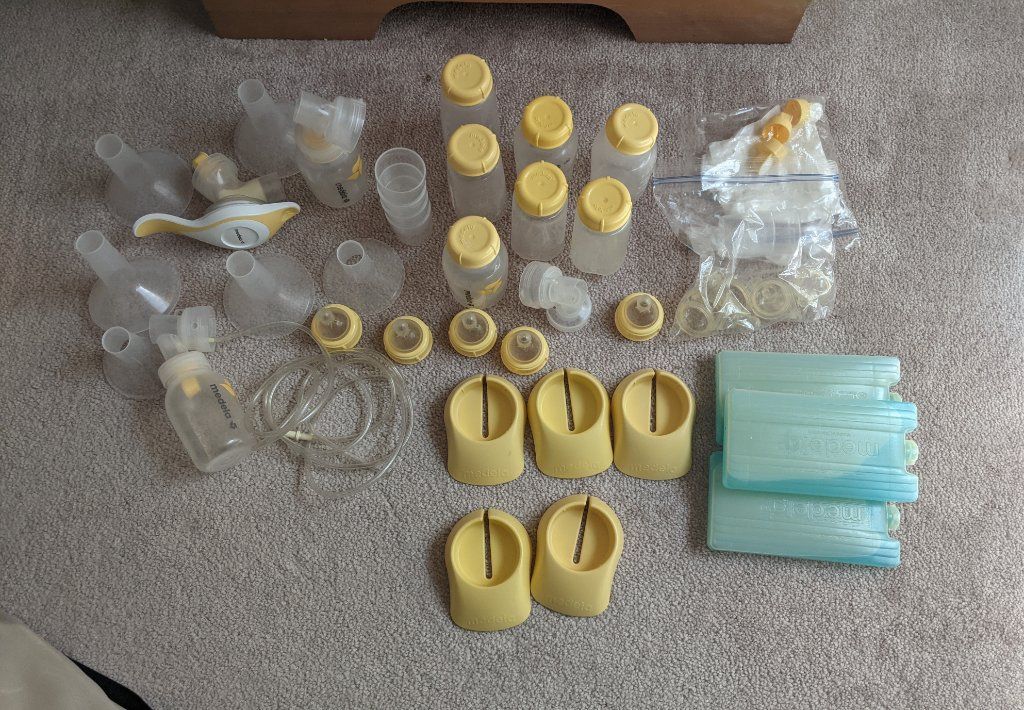 Medela Double Electric Advanced Portable Breast Pump Kit. With lots of extras