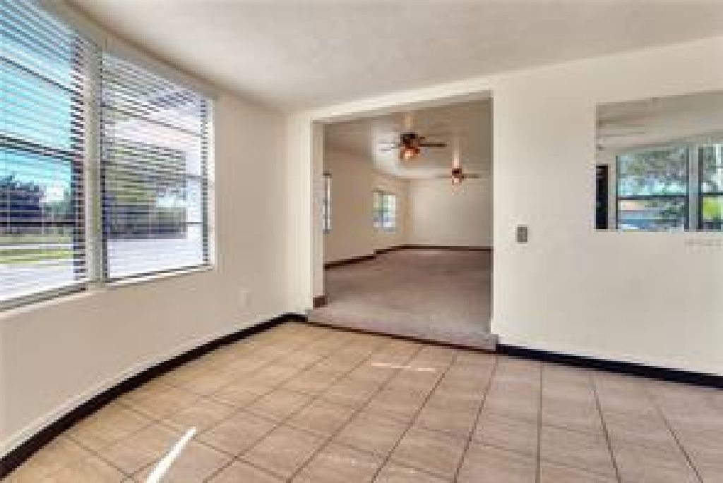 Located in Fort Meade this home has old world charm and space to grow into