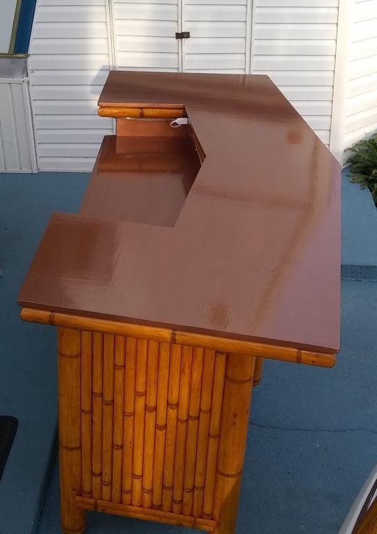 Bamboo Tiki Bar with storage cabinets. Outdoor patio furniture. Dining table