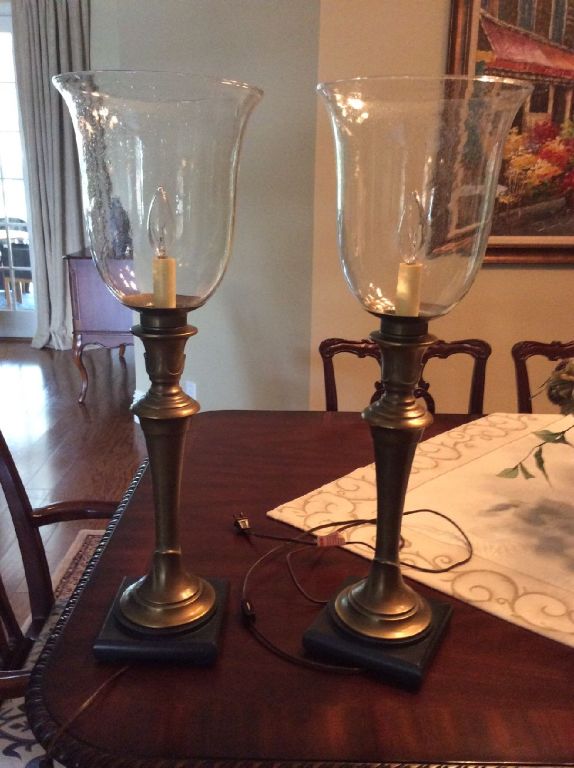 2 brass hurricane style lamps