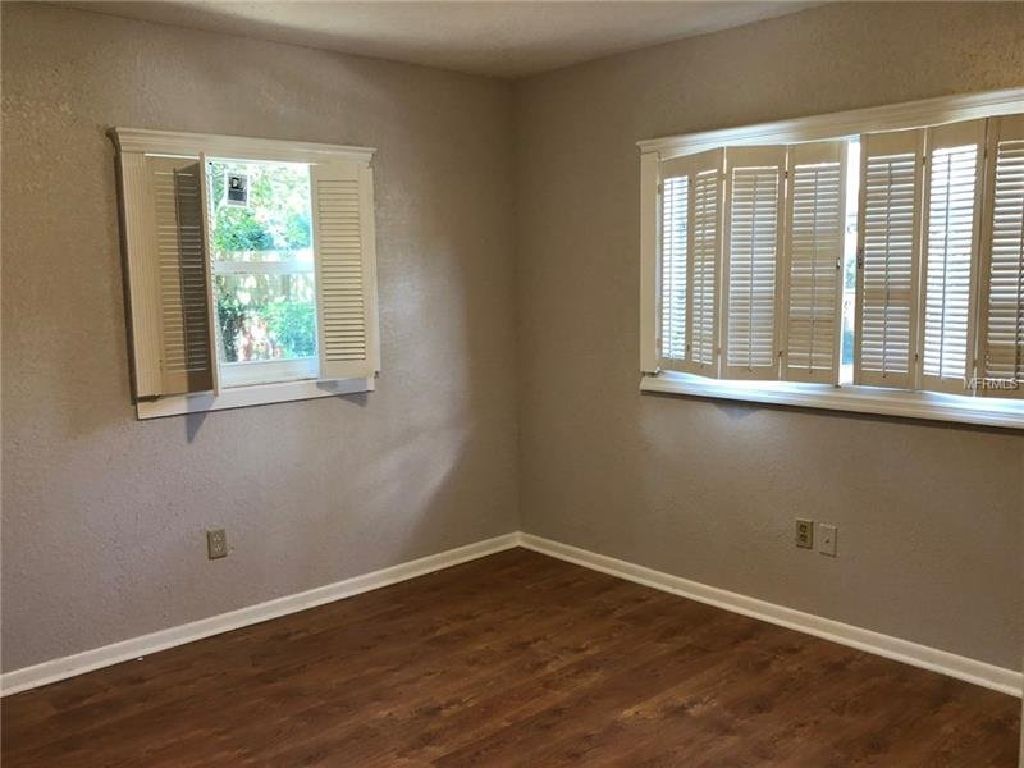 This home features newly painted exterior and interior, new kitchen with custom made wood cabinets.