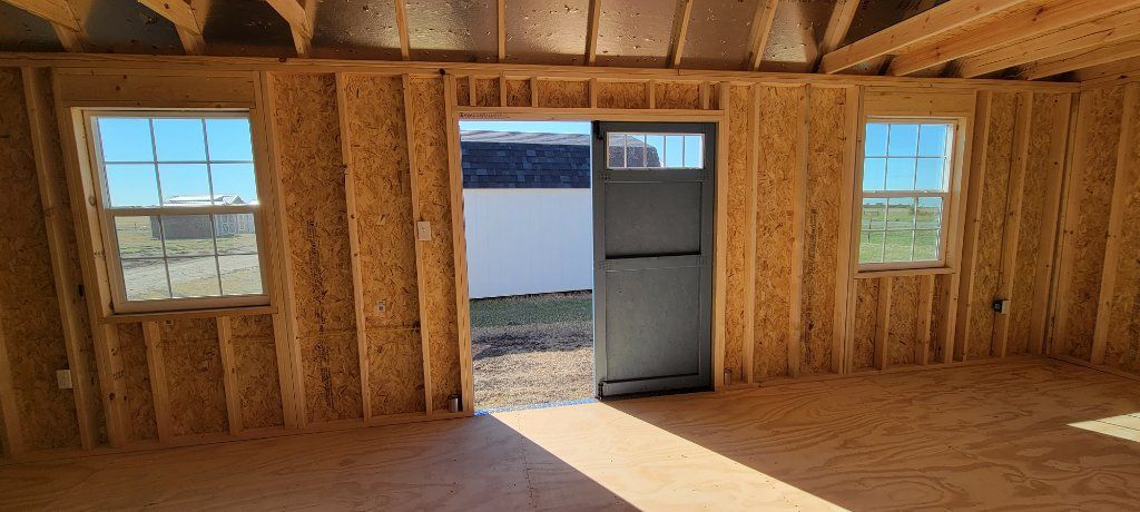 12x20 Elite Lofted Barn with rollup door 8ft walls
