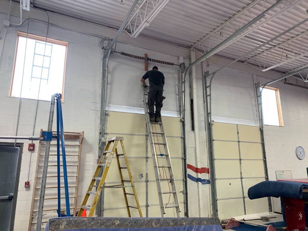 REPAIR AND INSTALL GARAGE DOORS ALL OVER NEW YORK AND LONG ISLAND