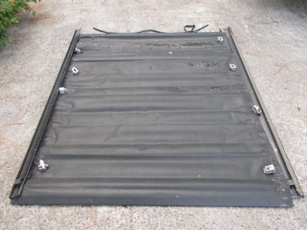 Roll up pickup truck bed cover