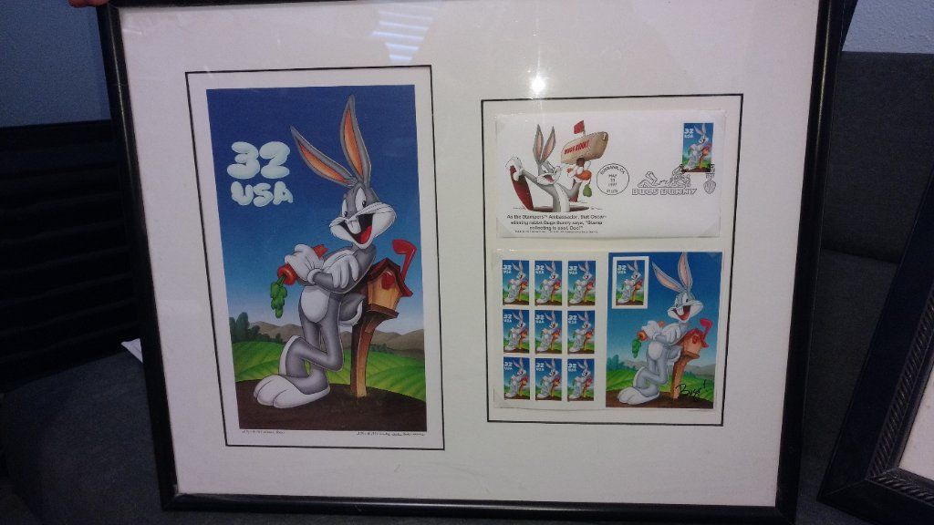 Disney collectible items with papers signed by artist