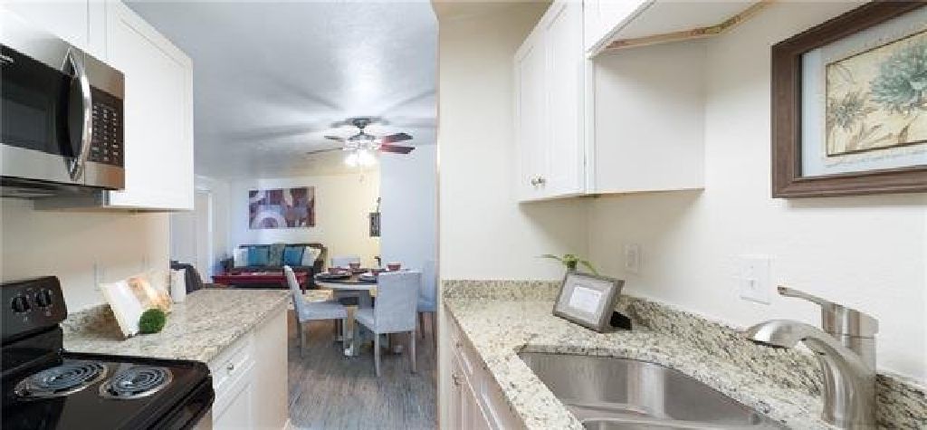 COME & SEE THIS MOVE IN READY CONDO