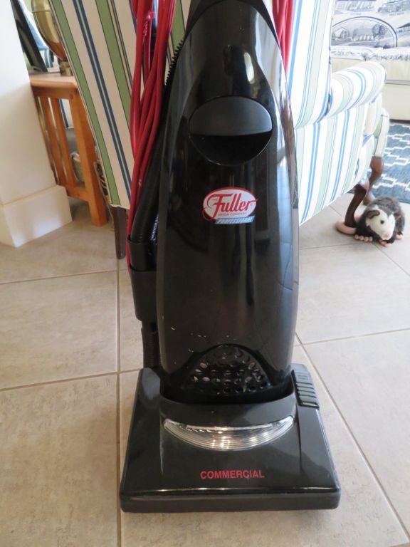 Upright industrial strength vacuum