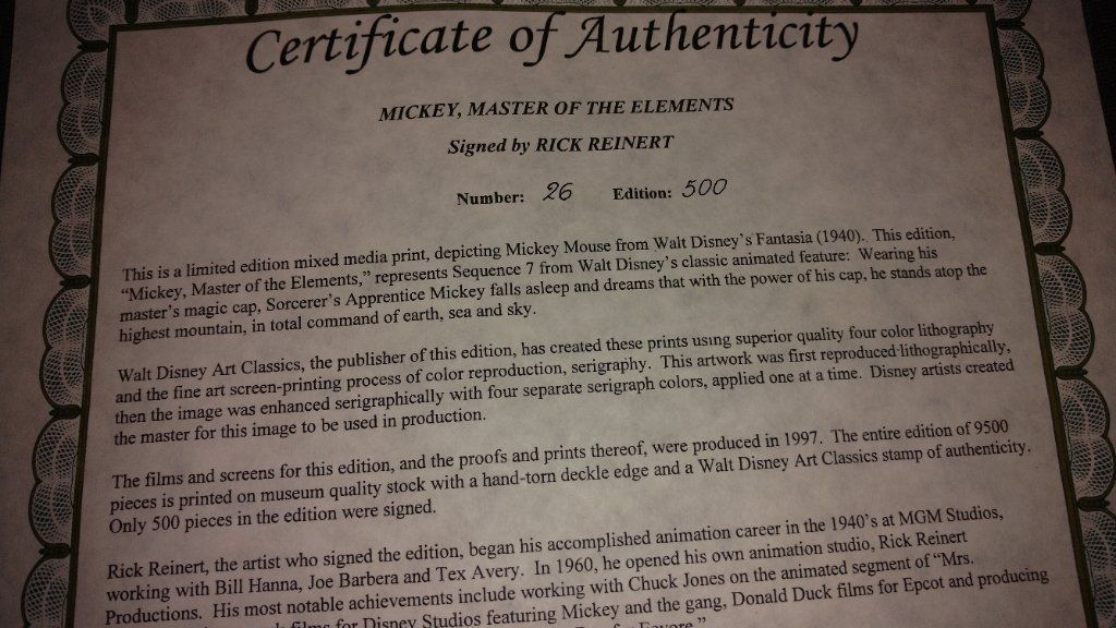 Disney collectible items with papers signed by artist