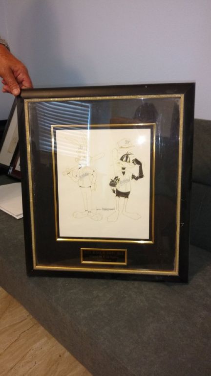 Disney collectible items with papers signed by artist