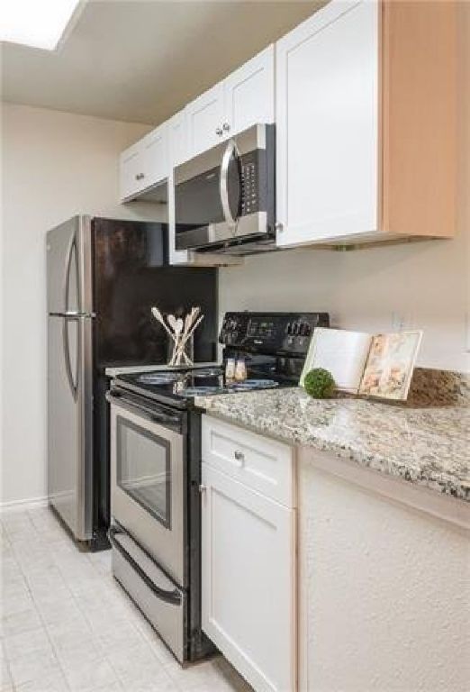 COME & SEE THIS MOVE IN READY CONDO