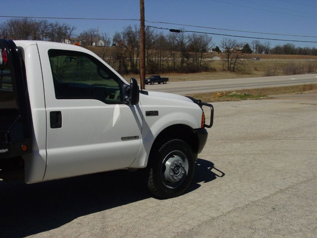 2001 Ford F450 7.3 Diesel 71k miles 4x4 6 speed New CM SS Model Flat Bed