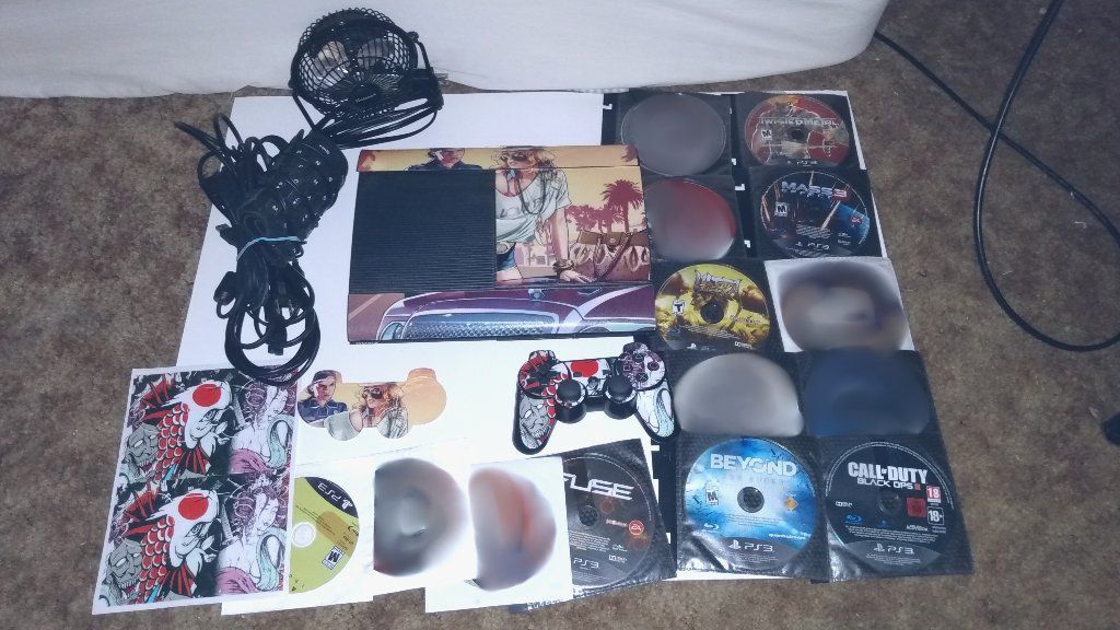 250 GB PlayStation 3 (Super Slim) 13 Game + Accessories Bundle