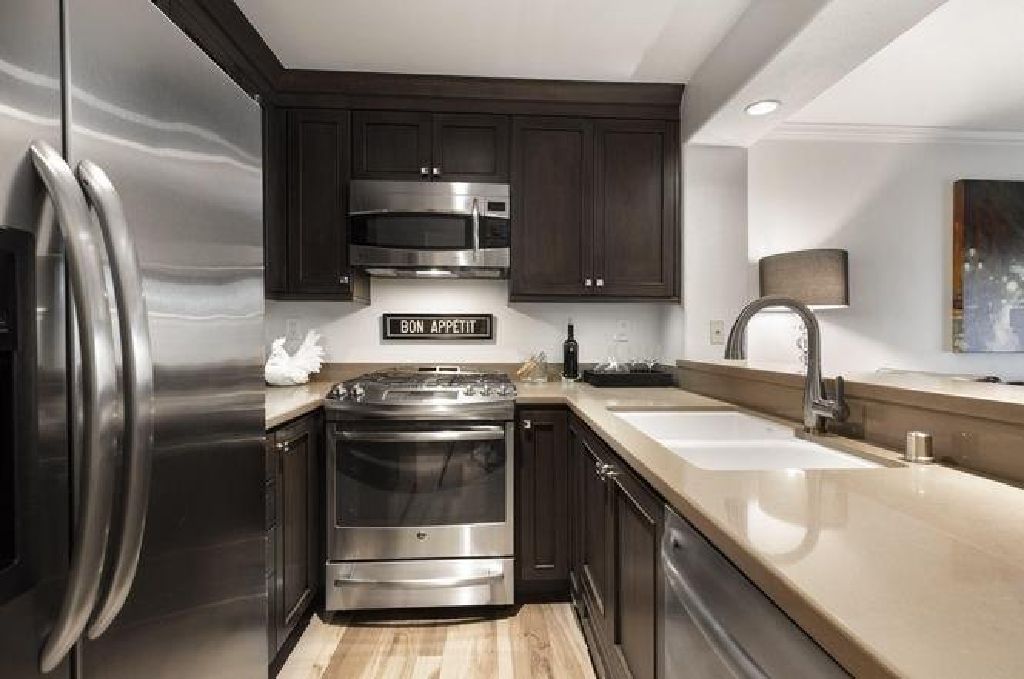 Beautifully remodeled ground level studio in the famed El Escorial condos at East Beach!