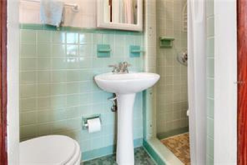 Located in Fort Meade this home has old world charm and space to grow into