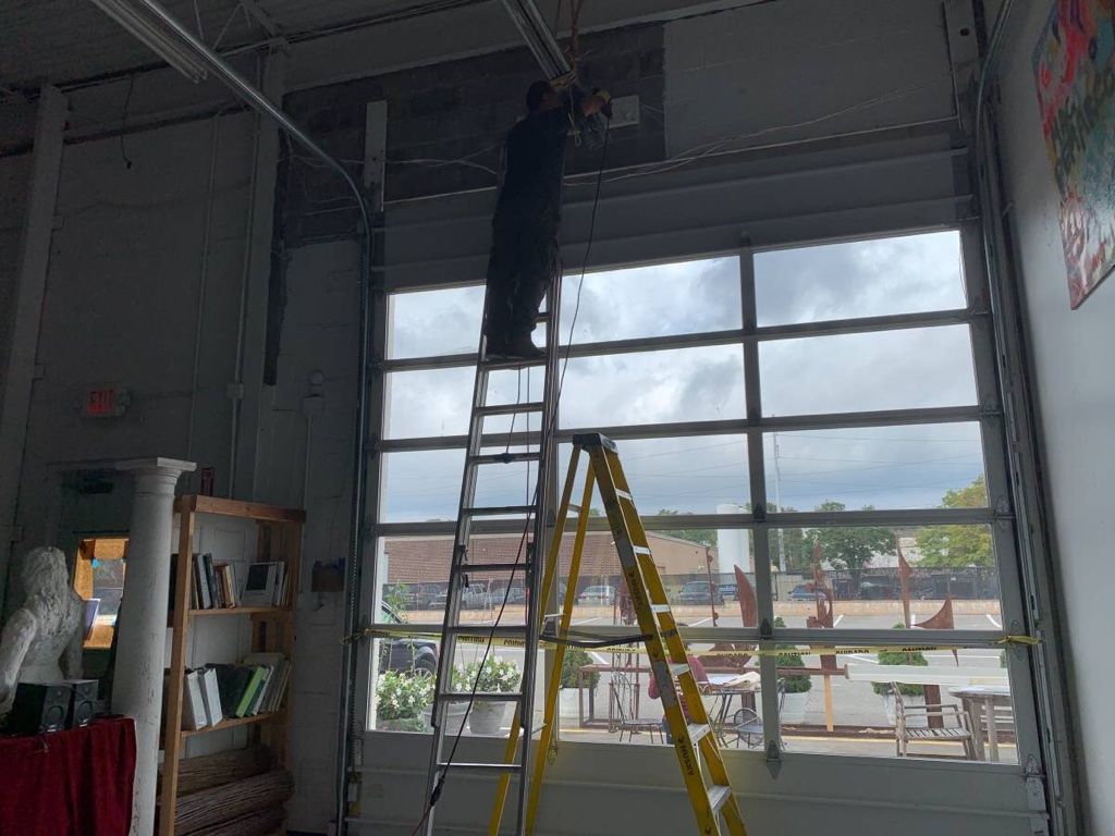 REPAIR AND INSTALL GARAGE DOORS ALL OVER NEW YORK AND LONG ISLAND