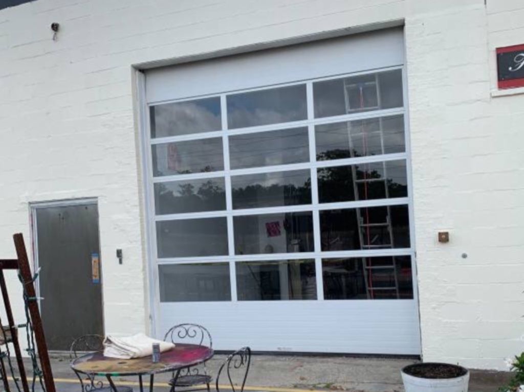 REPAIR AND INSTALL GARAGE DOORS ALL OVER NEW YORK AND LONG ISLAND