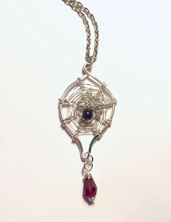 Silver spiderweb Pendant with Red Teardrop Crystal