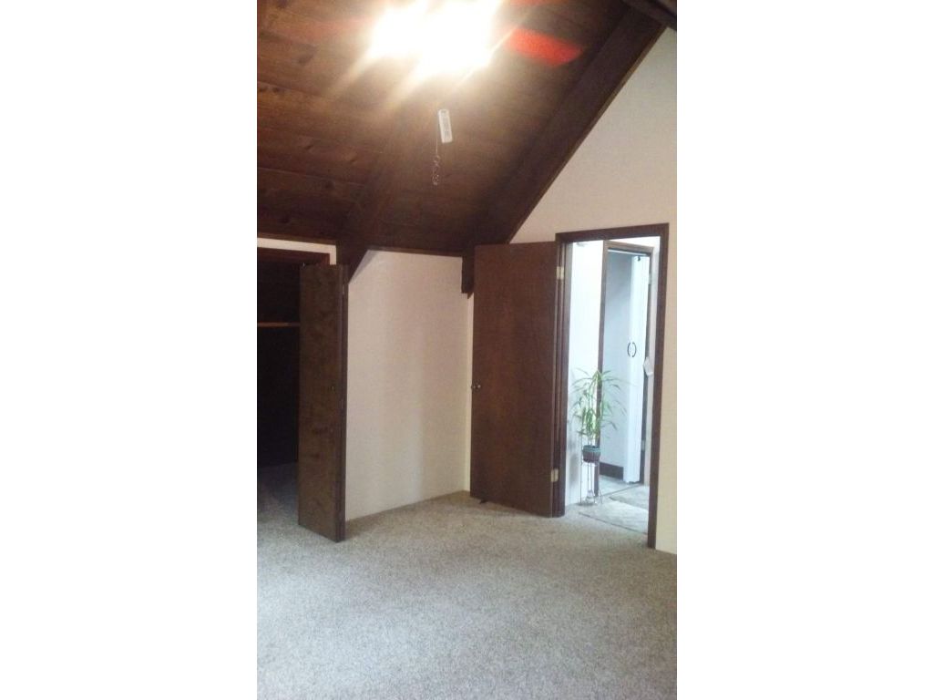 Lg. Rm Upstairs, Unfurnished or Furnished, 12' open beam chalet style w/1/2 bath