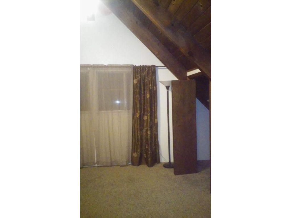 Lg. Rm Upstairs, Unfurnished or Furnished, 12' open beam chalet style w/1/2 bath