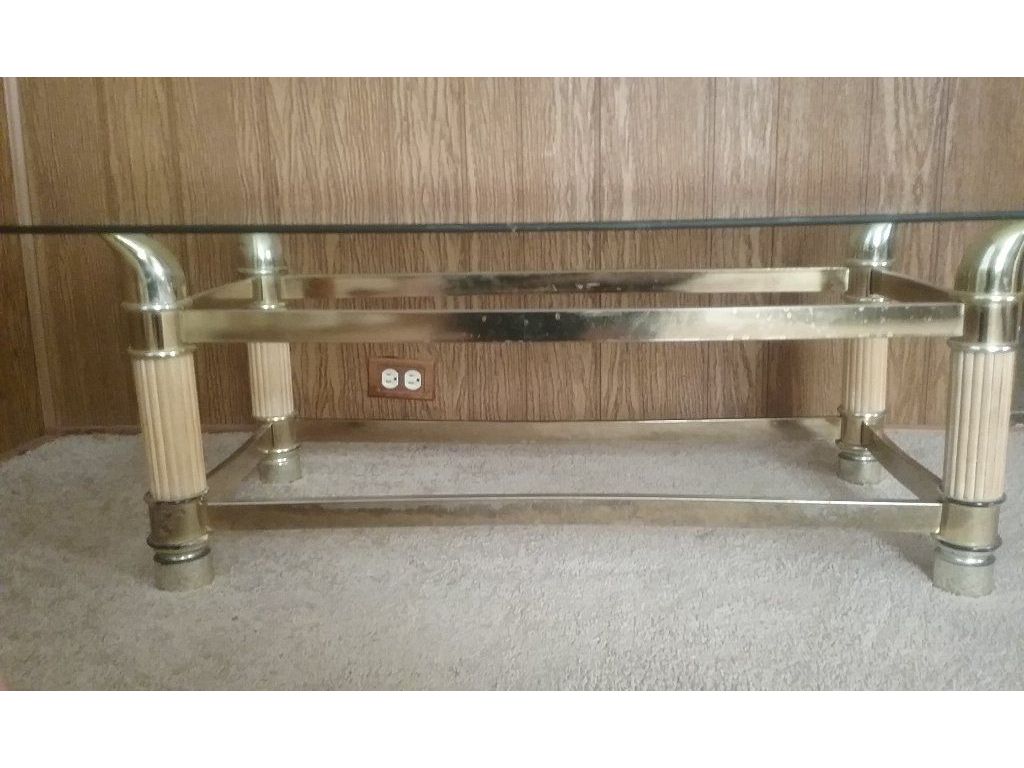 Sofa, recliner and glass coffee table.