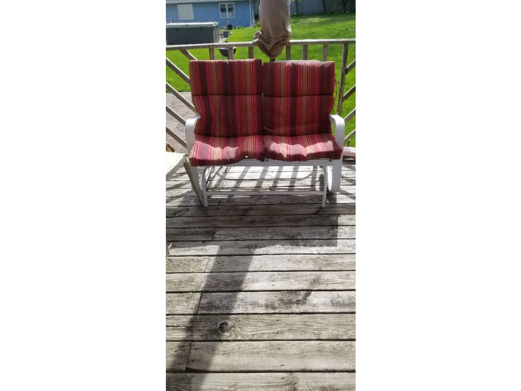 Lawn mower. Toys, clothes. Glider, new patio chair cushions, still have tags on