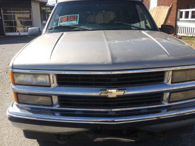 Chevy Tahoe 99 new tires run good and got high miles asking 2 grand for it .