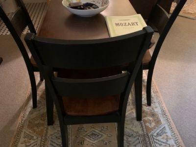 Table rectangle or round with fold down leaves, 4 chairs like new. Apartment size. Espresso.