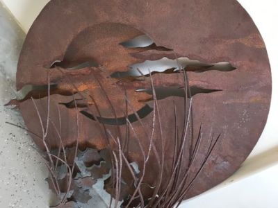 36” round heavy metal sculpture