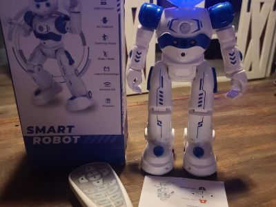 Smart robot remote control talks,sings,moves around in all directions and plays music