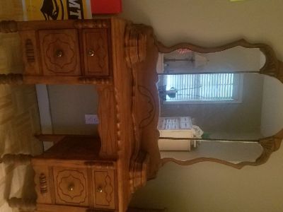 Beautiful antique vanity with 3 part mirror and 4 drawers.