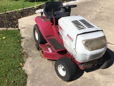 White outdoor riding mower