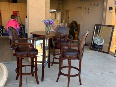 Bistro table and 3 leather swivel bar stools