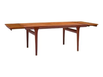 Kofod Larsen for Faarup Møbelfabrik Mid Century Teak Hidden Leaf Expanding Dining Table