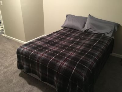 Almost new full pillow top bed with metal frame