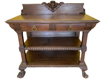 Late 19th Century Gothic Revival Side Board Buffet With Carved Lion Head Cornice
