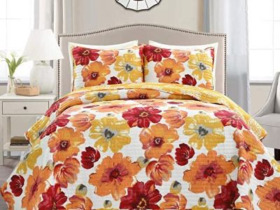 COMFORTER WITH MATCHING PILLOW CASES AND SKIRT.