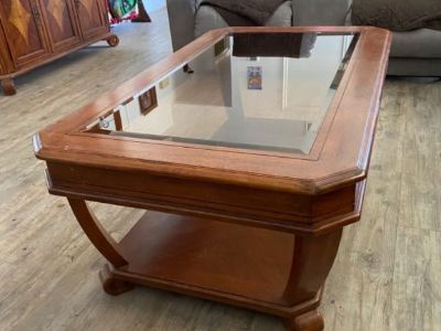 Mahogany coffee table with removable smoked glass top.