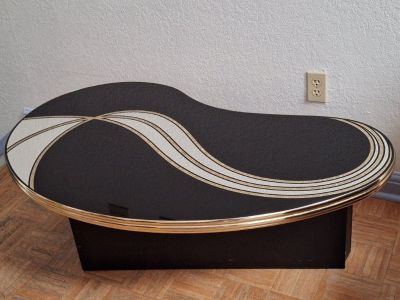 Uniquely shaped Coffee table $275