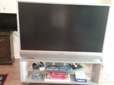 Mitsubishi Tv, model# WD-62530, with stand, needs lamp proximately $75 to replace