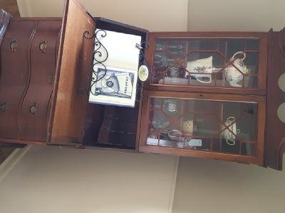 Antique Drop Leaf Secretary Desk with 4 nice size draws and a built in china cabinet