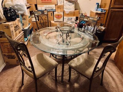 Glasstop dining room table and chairs
