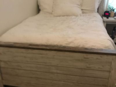 White wooden bed frame