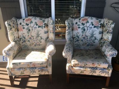 2 matching high back chairs with floral print