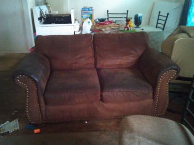 Brown suede sofa and loveseat
