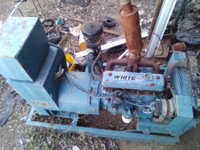 Four cylinder motor generator run off propane